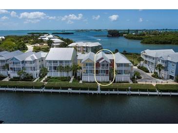 Waterfront property with a charming three-story home at 11708 Anglers Club Dr # 125, Placida, FL 33946