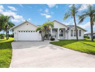 Single-Gathering home with two-car garage and landscaping at 26021 Templar Ln, Punta Gorda, FL 33983