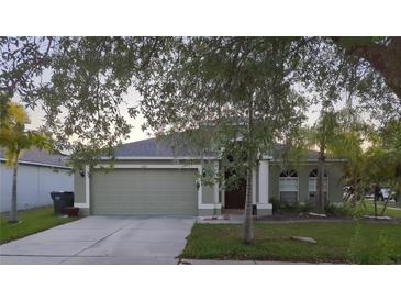 House exterior with green lawn at 2332 Potomac Mark Pl, Ruskin, FL 33570