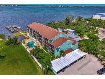 Waterfront property with private pool and parking at 53 W Bay Heights Rd # 205, Englewood, FL 34223