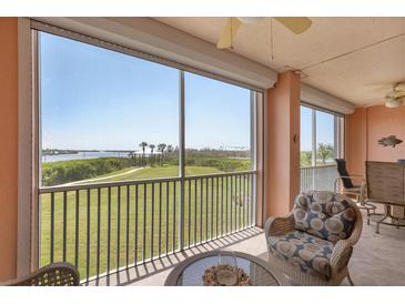 Relaxing balcony overlooking scenic water views at 13413 Gasparilla Rd # D203, Placida, FL 33946