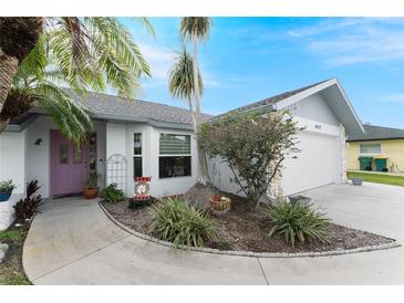 Charming single-story home with landscaped yard at 10127 Peach Ave, Englewood, FL 34224