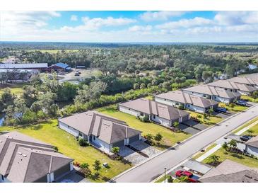 Stunning aerial view of new single-Gathering homes in a well-planned community at 2088 Bonito Way, Port Charlotte, FL 33953