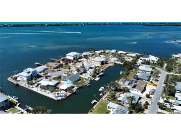 Beautiful waterfront homes with private docks line the canals in this coastal community at 741 W Perry St, Englewood, FL 34223