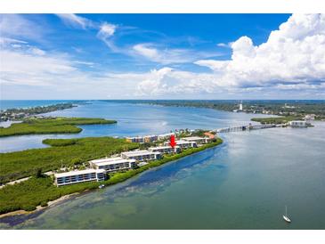 Waterfront condos with amazing water views, lush landscaping, and a community pool and private boat docks at 1591 Beach Rd # 402, Englewood, FL 34223