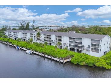 Waterfront condos offer beautiful views and private docks for boating access at 1401 S Mccall Rd # 205, Englewood, FL 34223