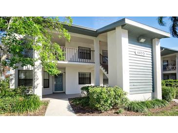 Inviting two-story condo with well-maintained landscaping and a welcoming entrance at 4655 46Th Street Ct # 101, Bradenton, FL 34210