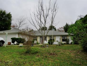 Photo one of 4490 Devonshire Ave Spring Hill FL 34609 | MLS L4942040