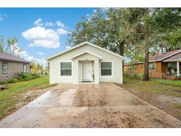 Newly built home with a large driveway at 1110 W Madison St, Plant City, FL 33563