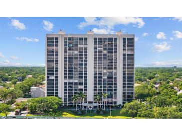 Striking high-rise condo building with meticulously maintained landscaping and gorgeous trees surrounding property at 3301 Bayshore Blvd # 503, Tampa, FL 33629