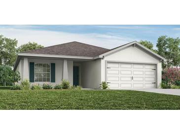 Charming single-story home featuring a well-manicured lawn and a two-car garage at 7019 161St E Ter, Parrish, FL 34219