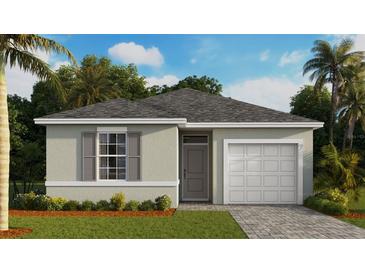 One-story house with grey exterior and a two-car garage at 14461 Bulger Ave, Port Charlotte, FL 33953
