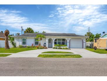Ranch style home with landscaped yard at 8509 La Boca Ave, North Port, FL 34287