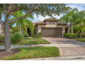 Two-story house with a two car garage at 19185 Mangieri St, Venice, FL 34293