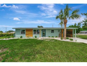 Updated ranch home with modern facade and landscaping at 1757 Mova St, Sarasota, FL 34231