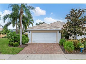 One-story house with a one-car garage and well-maintained landscaping at 6057 Erice St, Venice, FL 34293