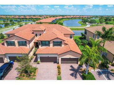 Luxury two-story townhome with lake view at 10780 Tarflower Dr # 102, Venice, FL 34293
