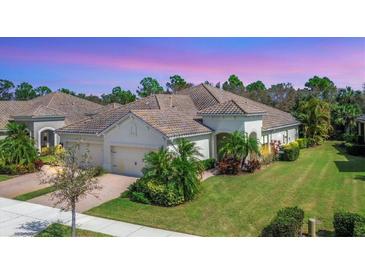 Single-Gathering home with tile roof and two-car garage at 1222 Collier Pl, Venice, FL 34293