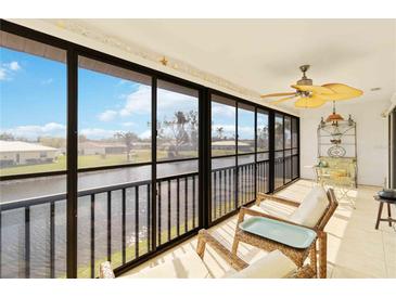Relaxing screened balcony overlooking the canal at 1743 Lake Pl # 1743C, Venice, FL 34293