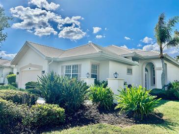 Charming single-story home with lush landscaping at 663 Crossfield Cir # 3, Venice, FL 34293