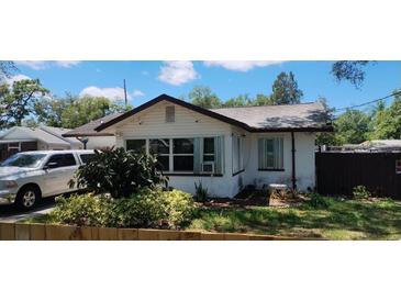 One-story home with a well-maintained lawn and mature trees at 2812 18Th E St, Bradenton, FL 34208