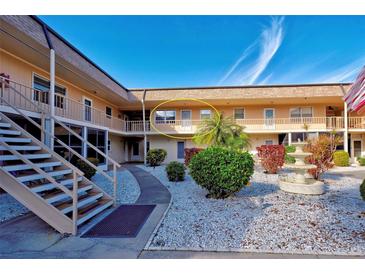 Ground level condo unit with balcony and courtyard view at 537 Manatee Ct # 204, Venice, FL 34285