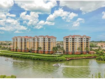 Beautiful waterfront condo community with lush landscaping and boat access at 157 Tampa E Ave # 807, Venice, FL 34285