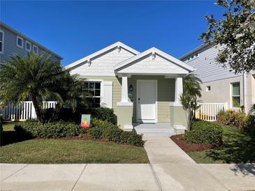 Charming one-story house with white accents and landscaped lawn at 12681 Sagewood Dr, Venice, FL 34293