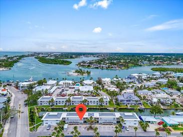 Aerial view of waterfront property close to amenities and with stunning views of the water at 902 Gibbs Rd # 181, Venice, FL 34285