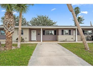 Charming single-story home featuring well-maintained landscaping, a private driveway, and a welcoming entrance at 1703 Bal Harbour Dr # 2, Venice, FL 34293