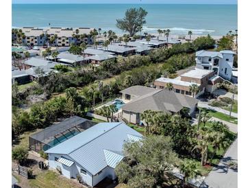 Beautiful coastal community home near ocean with a lush yard and private pool in a desirable neighborhood at 388 Flamingo Dr, Venice, FL 34285