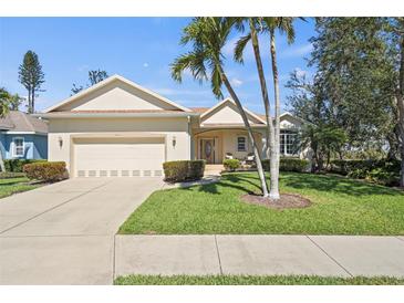 Charming single Gathering home with a well maintained lawn and mature palms at 8603 46Th Avenue W Cir, Bradenton, FL 34210