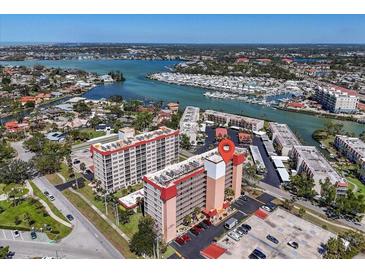 Stunning aerial view of waterfront condo complex with bay views and marina access at 232 Saint Augustine Ave # 802, Venice, FL 34285