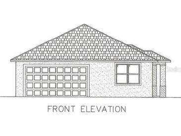 Charming front elevation showcases a classic design with a two car garage and window at 0 Sorrento Pl, Nokomis, FL 34275