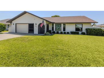 Charming one-story home with well-maintained lawn and inviting curb appeal at 1231 Pine Needle Rd, Venice, FL 34285