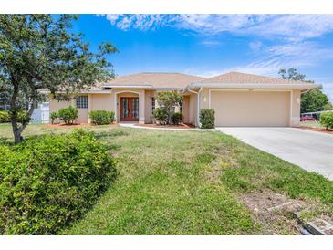 Charming single-story home with a well-manicured lawn and inviting curb appeal at 3851 Sterling Rd, Venice, FL 34293