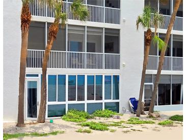 Beachfront condo with large windows and sliders offering beautiful ocean views and access at 333 The Esplanade N # 102, Venice, FL 34285
