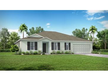 One-story home with a light green exterior, dark shutters and a two-car garage at 27206 Adams St, Punta Gorda, FL 33983