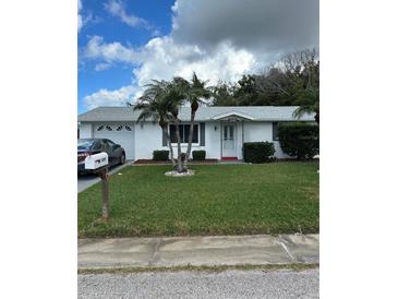 Photo one of 3345 Garfield Dr Holiday FL 34691 | MLS O6174142