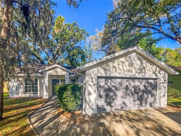 Photo one of 2405 Woody Trace Ln Tampa FL 33612 | MLS O6194672