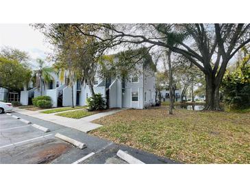 Photo one of 7120 Waterside Dr # 106 Tampa FL 33617 | MLS O6197079
