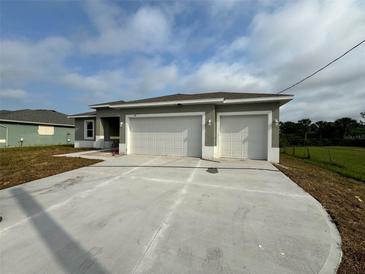 Photo one of 70 Par View Rd Rotonda West FL 33947 | MLS O6202141