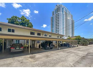 A charming condo with covered parking and convenient access to a nearby highrise at 3421 S Carter St # C, Tampa, FL 33629