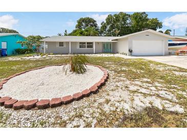 Newly renovated single-Gathering home with a landscaped yard at 1900 63Rd S Ave, St Petersburg, FL 33712