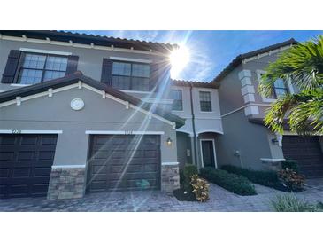 Townhouse with 2-car garage and nicely landscaped entry at 7224 Ketch Pl, Bradenton, FL 34212