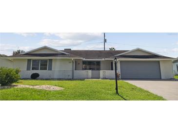 Front view of a ranch-style house at 716 Fox Hills Dr, Sun City Center, FL 33573