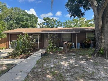 Photo one of 6513 Runningwoods Dr Tampa FL 33634 | MLS O6238295