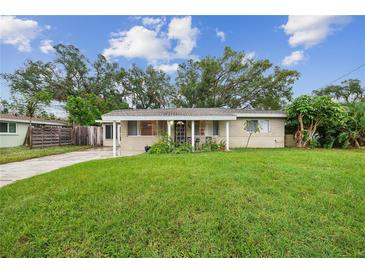 Charming ranch home with a spacious lawn and mature trees at 4536 Brooksdale Dr, Sarasota, FL 34232