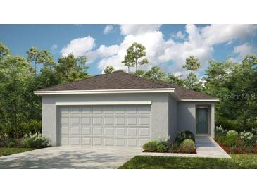 Single-story home with a two-car garage and neutral color scheme at 5807 Laurelcrest Gln, Palmetto, FL 34221