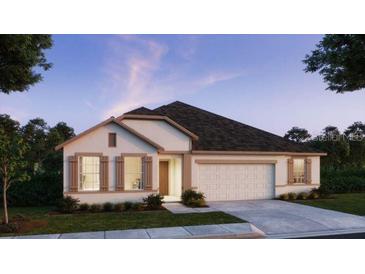 Charming single-story home with a welcoming front porch and attached two-car garage at 11435 Petrel Ave, Weeki Wachee, FL 34614